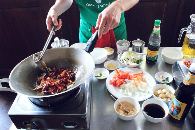 May Kaidee Thai Cooking Class at Bangkok with Pickup - Getting there: pickup times, A/C vehicle, and the meeting spot