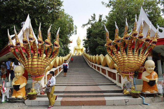 One Day Splendid Pattaya Private Day Tour from Bangkok - Khao Chi Chan (Buddha Mountain): the big cliff statue stop