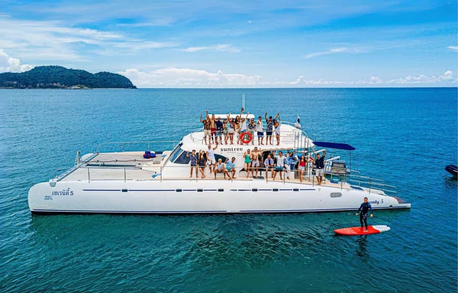Pattaya: 3 Islands Day Tour on Catamaran with Buffet Lunch - Onboard fun between islands: slide, paddleboard, floating pool, and fishing gear