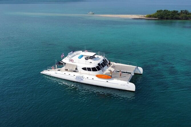 Pattaya: 3 Islands one day trip on Catamaran with Lunch - Stop 3: Koh Ped for monkey feeding, photos, and island views