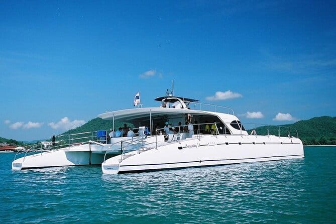 Pattaya: 3 Islands one day trip on Catamaran with Lunch - Stop 1: Koh Phai for crystal water, snorkeling, and a waterslide