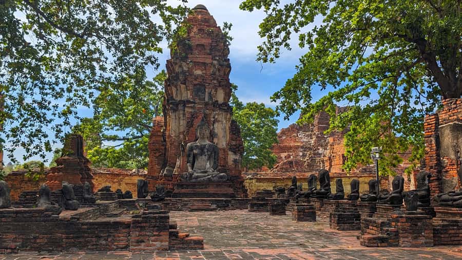 Pattaya: Ayutthaya Day Trip by Private Car with Boat Tour - Temple circuit by boat: 9 stops with real variety