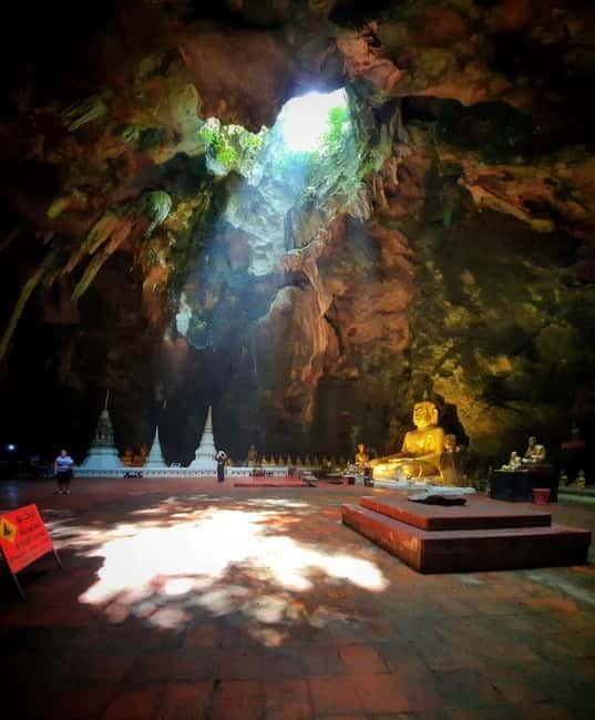 Petchaburi Temples & Royal Palace - small Join Group Tour - Khao Luang Cave Temple: sunbeams, Buddha statues, and the cave challenge