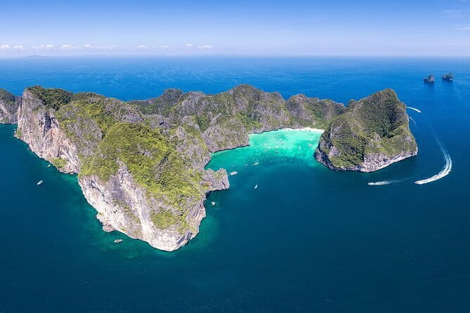Phang Nga Bay Day Trip to Panak and James Bond Island by Speedboat from Phuket - Koh Rang Yai beach time: warm water and shade