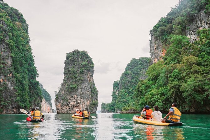 Phang Nga Bay Sunset Cruise Dinner with Sea Canoe and Loy Krathong from Phuket - Sea-canoeing at Hong Island: caves, limestone stacks, and tight passages
