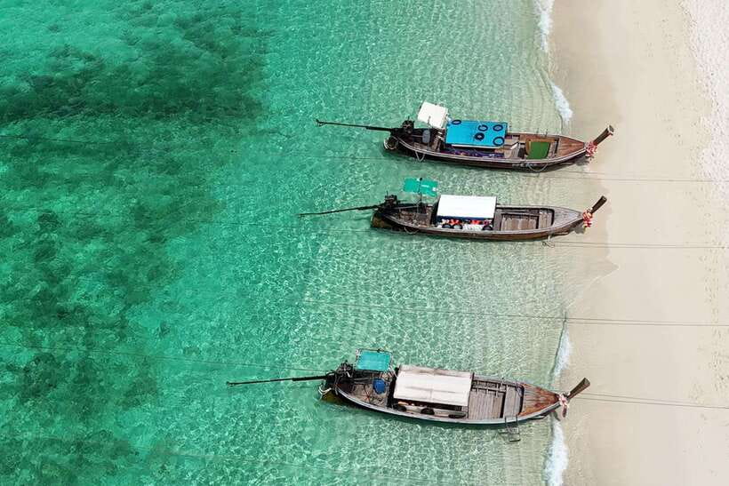 Phi Phi: 7 Islands longtail boat with Sunset and Plankton - Monkey Beach and Viking Cave: The quick stops that set the tone