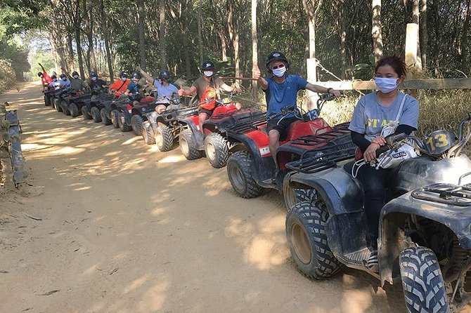 Phuket ATV Adventure Tour - The jungle trail ride: hills, rubber plantations, villages, and muddy fun