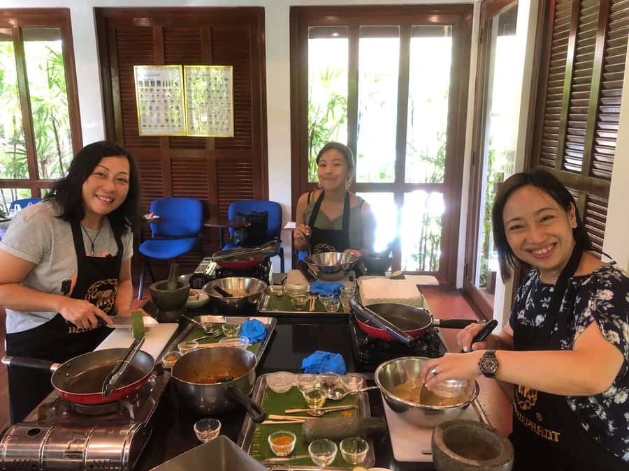 Phuket - Blue Elephant Thai Cooking Class with Market Tour - Group size, language, and the vibe in the kitchen