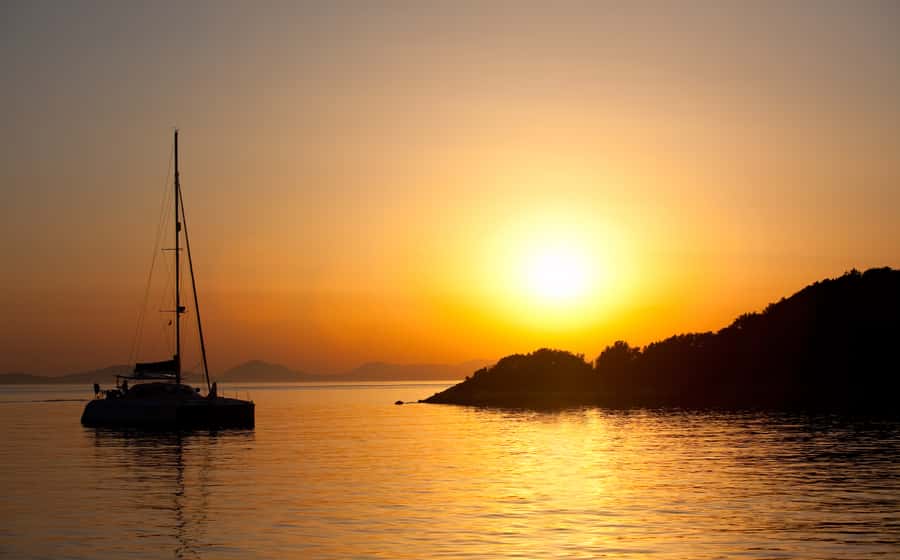 Phuket Catamaran Tour in Coral Island and Sunset Voyage - Getting Picked Up and Sailing Smoothly (Hotel Zones and Extra Fees)