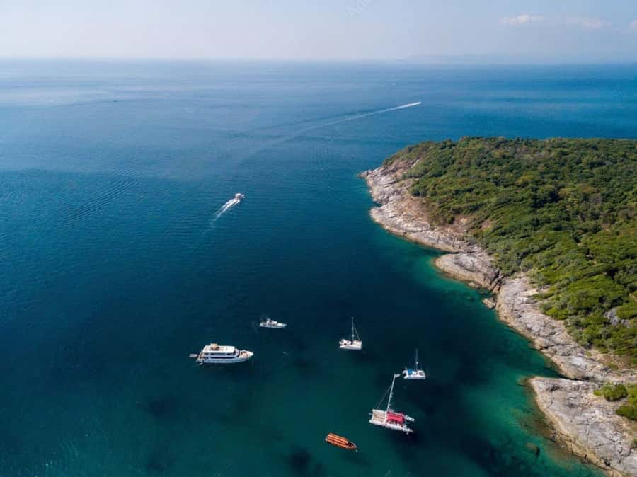 Phuket: Coral and Racha Island Yacht Tour with Lunch - Lunch on Board: Staying Refueled While You Cruise Toward Racha