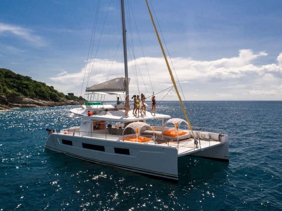 Phuket: Coral and Racha Island Yacht Tour with Lunch - Getting to the Yacht: Pickup, Safety Briefing, and Welcome Drinks