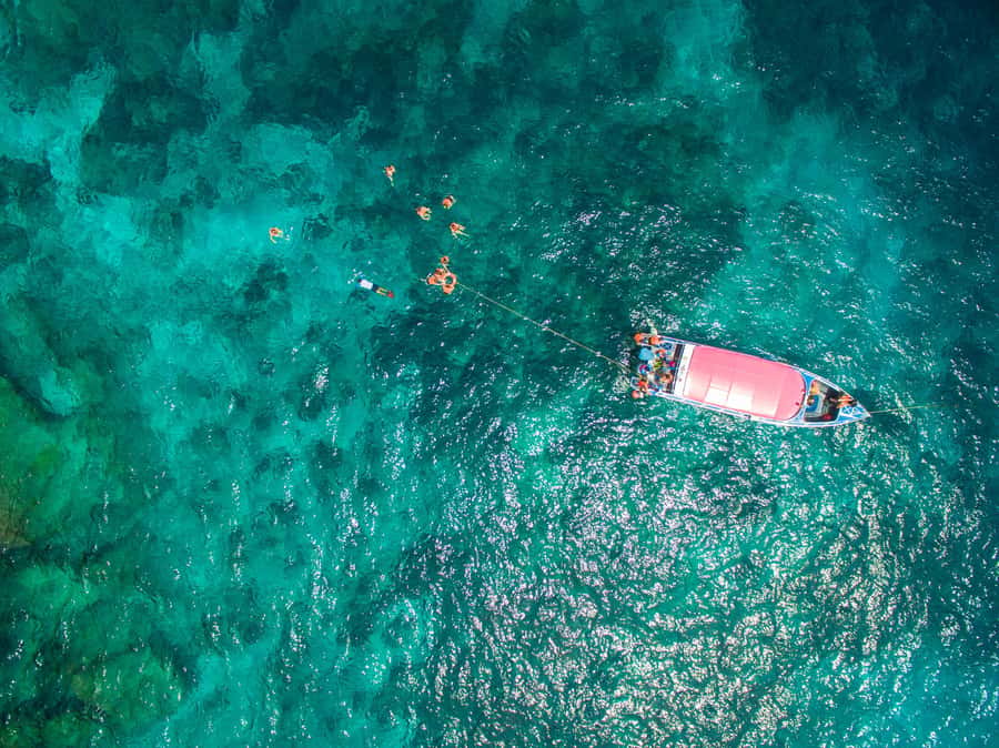 Phuket: Coral Island Longtail Boat Cruise with Snorkeling - Coral Island and Banana Beach: the calm side of Phuket