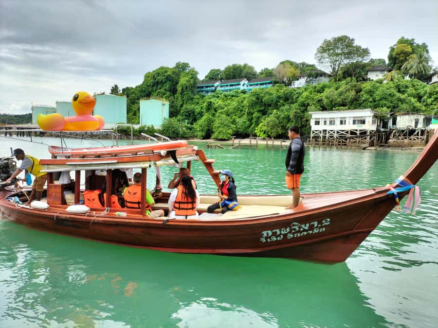 Phuket: Coral Island Luxury Long Tail Boat Half-Day Tour - Coral Island beach time: white sand, sun, and a slower pace