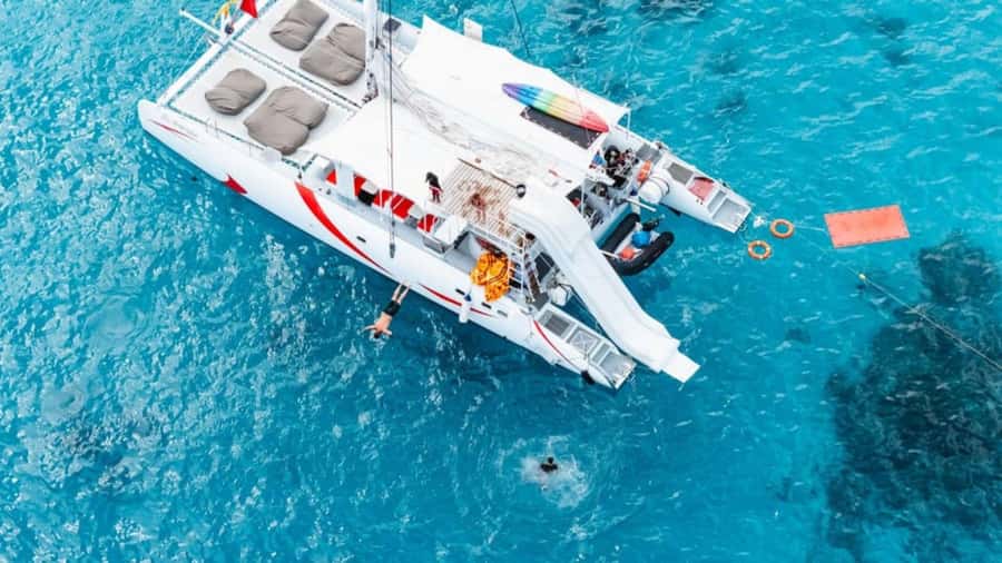 Phuket : Coral Island & Racha Island by Catamaran Tour - Group Size, Language, and Onboard Atmosphere
