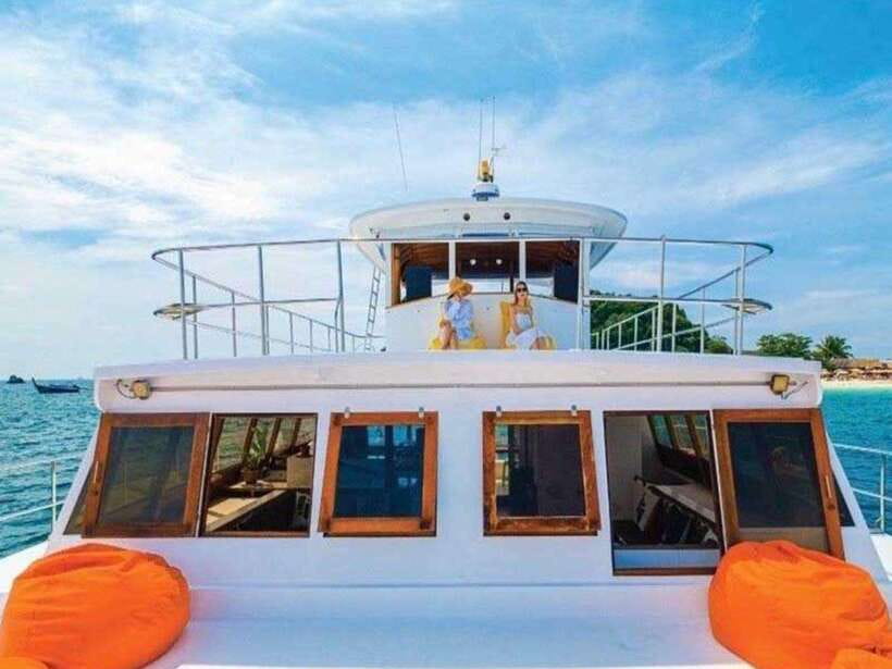 Phuket: Coral Island Snorkeling and Sunset Catamaran Cruise - Laem Krating: the sailboat-shaped rock photo moment