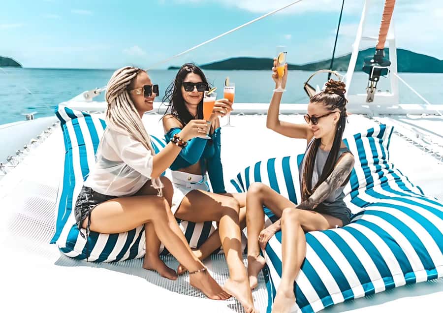 Phuket: Coral, Racha, Promthep Island Catamaran Trip & Lunch - Maiton Private Island: Photo Stop, Swimming, and Dolphin Watching