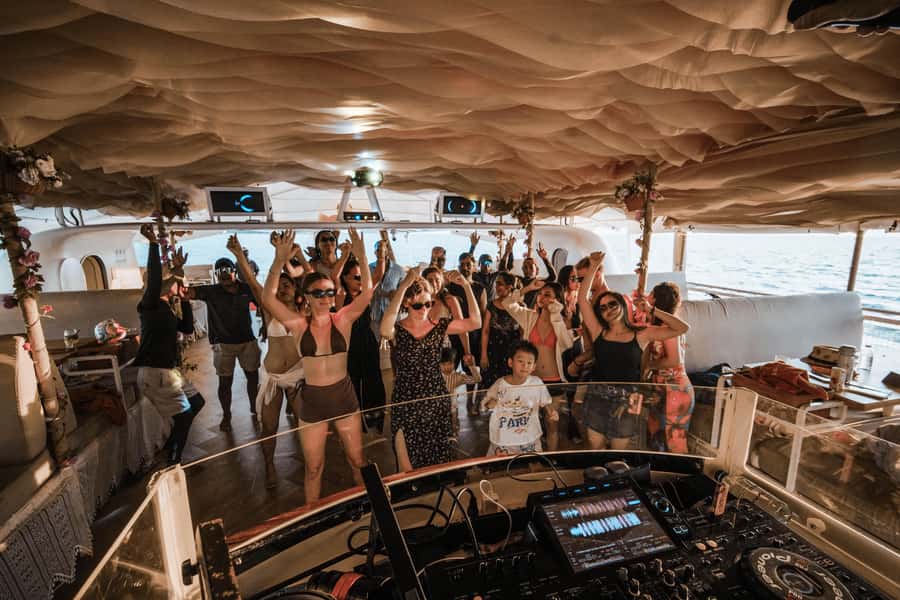 Phuket: Coral & Racha Sunset Luxury Catamaran Party Cruise - Luxury catamaran comfort: net lounge, cabins, and real room to move