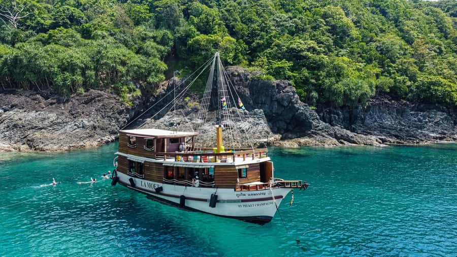 Phuket: Escape the crowds on relaxing boat (Snorkelling) - From hotel pickup to MV Phuket Champagne: how the day starts
