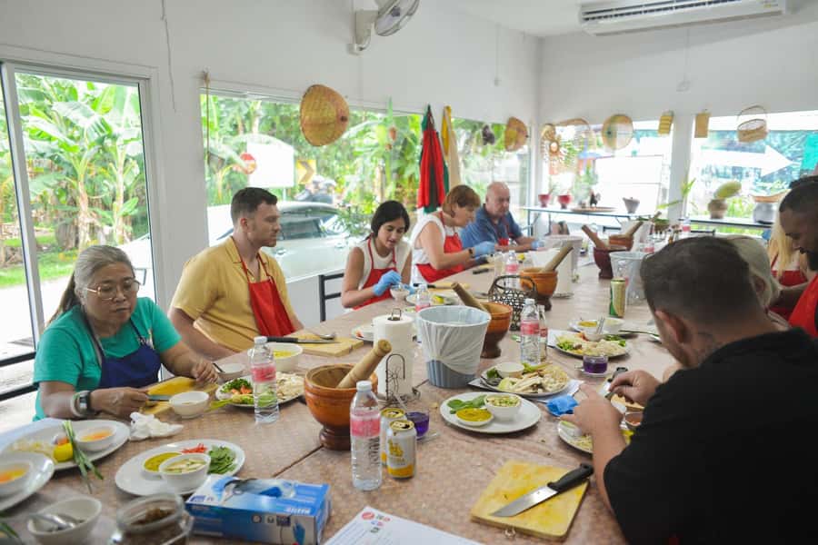 Phuket: Half Day Thai Cooking Experience with Market Tour - The open kitchen: chef-led, hands-on cooking in a practical setup