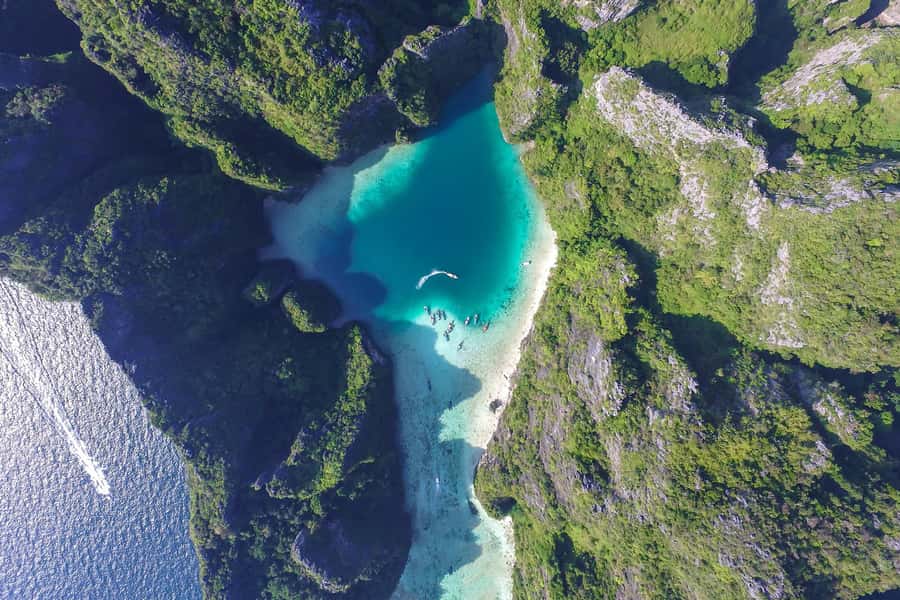 Phuket/Khao Lak: Snorkeling Trip to Phi Phi & Bamboo Islands - Viking Cave: the helmet-shaped opening and practical snorkeling guidance