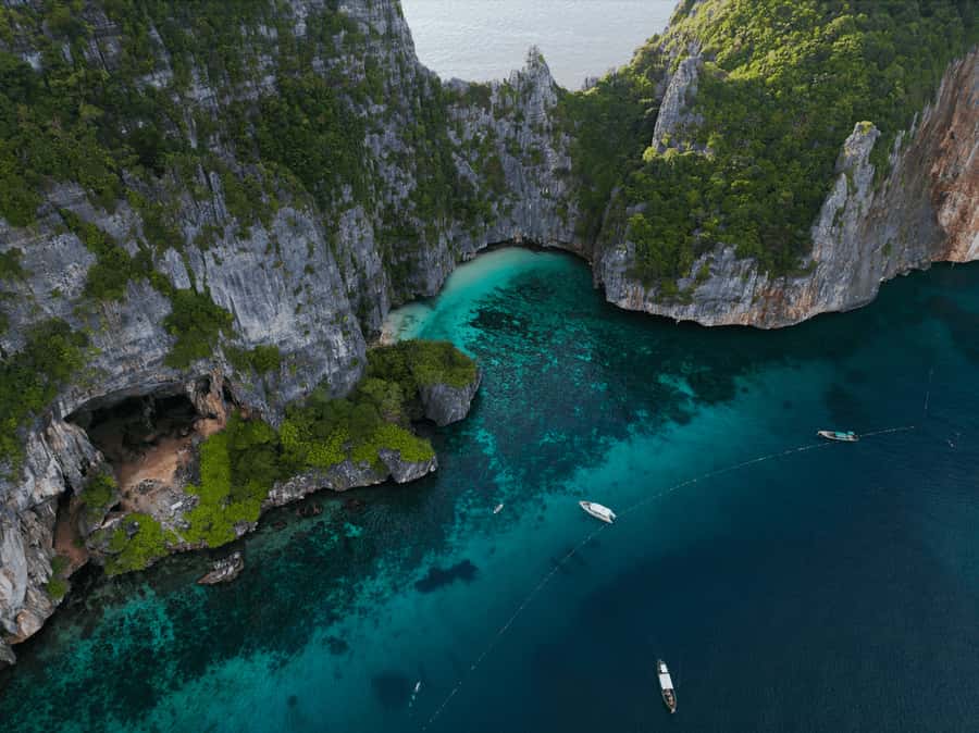 Phuket: Phi Phi Island & Maya Bay Luxury Yacht Day Tour - Pi Leh Lagoon: limestone cliffs up close, with a calmer pace