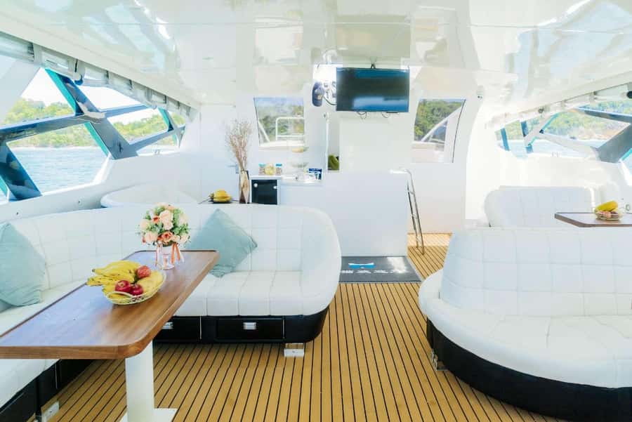 Phuket: Phi Phi & Maithon Island Day Trip by Power Catamaran - Mai Thon Island in the late day: snorkeling plus slider and SUP