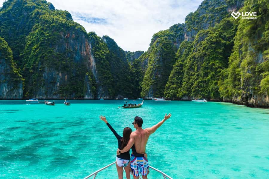 Phuket: Phi Phi Pileh Lagoon Bamboo Island by Speed Boat - The speedboat ride: cliffs, bays, and the big-window view
