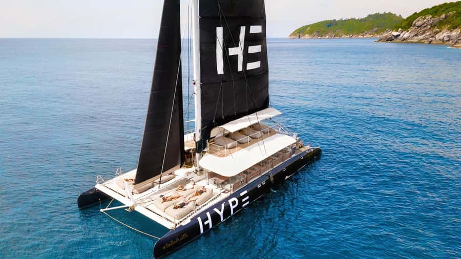 Phuket: Racha and Coral Island Sunset Catamaran Party Tour - Racha Island Walking + Snorkeling: More Island Feel, Same Easy Pace
