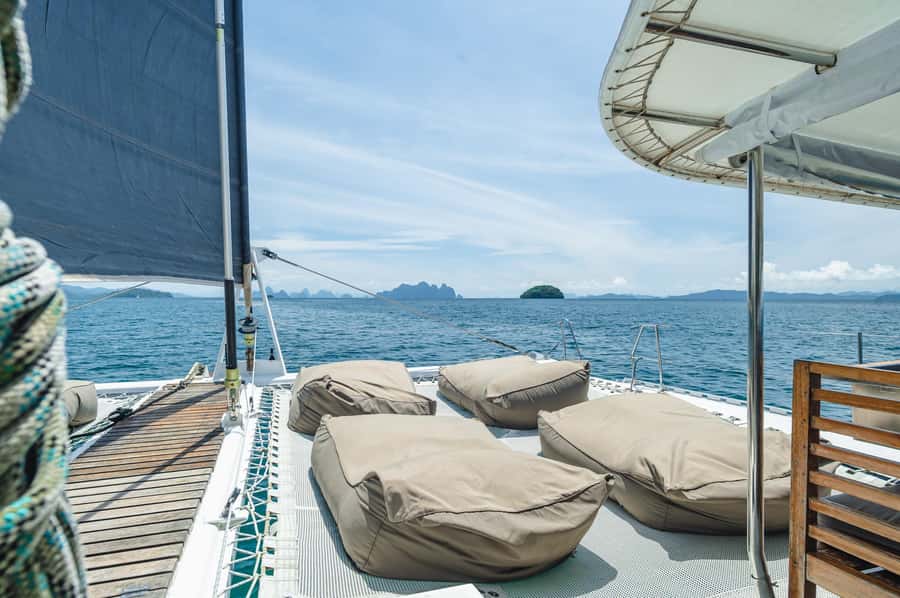 Phuket: Racha and Coral Island Sunset Catamaran Party Tour - Lunch, Morning Tea, Fruits, and Included Sea Sports: What You Actually Get for $160