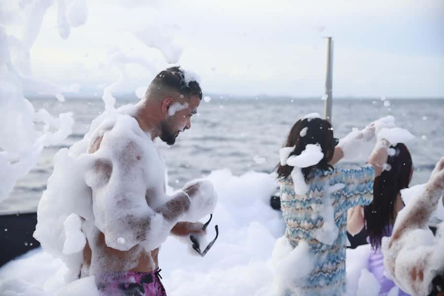 Phuket: Racha & Coral Island Catamaran Tour With Foam Party - The Archer foam party: music, water games, and full-group energy