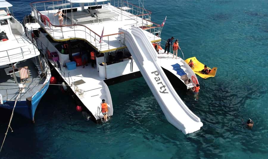 Phuket: Racha & Coral Island Catamaran Tour With Foam Party - Coral Island time: lunch break plus a first snorkeling session