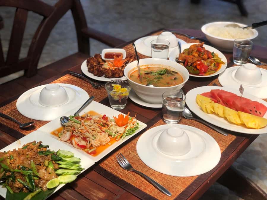 Phuket: Racha Islands Premium Tour with Snorkel & Lunch - Passing Maiton Island: dolphins are possible, not guaranteed