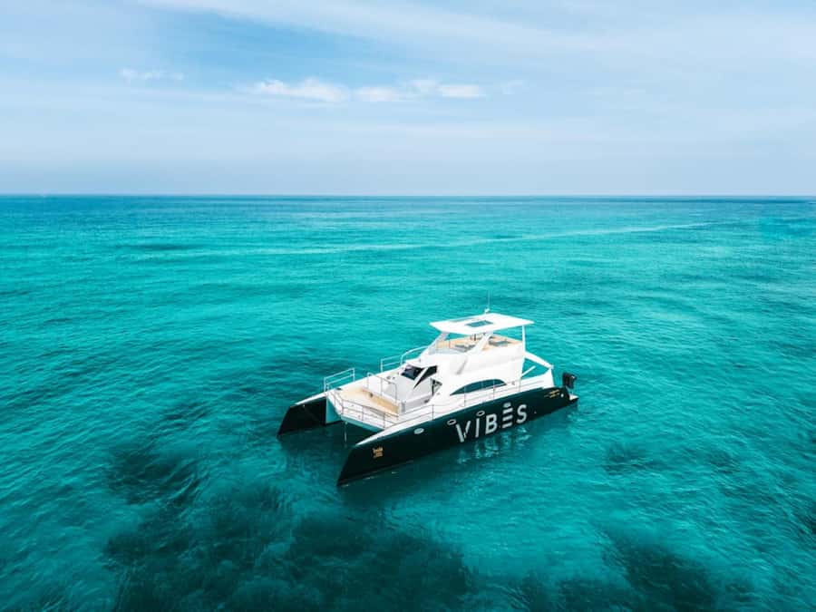 Phuket: Racha Noi & Maiton Catmaran Tour with Beach Picnic - Racha Noi beach picnic and surf sofa ride: the break that makes the day