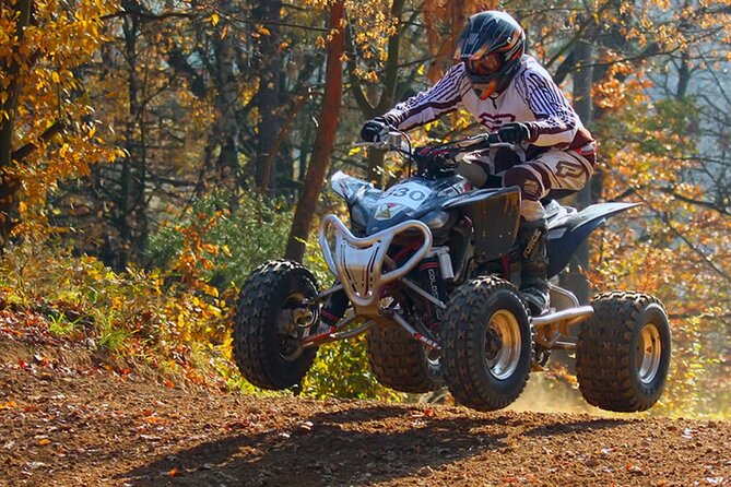 Phuket Rafting ATVing Flying Fox Full Day Activities By VIP Mini Van - ATV Through Farms, Plantation Paths, and Palm Gardens