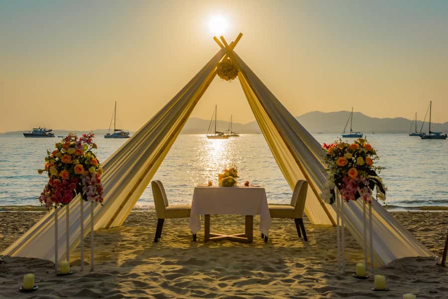 Phuket: Romantic Dinner on Cape Panwa Beach - The Romantic Setup: Beach Table, Flowers, and Sunset Light