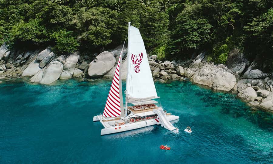 Phuket: Sailing Yacht Island Hopping & Party Full-Day Cruise - Banana Beach to Racha Yai: the day’s rhythm