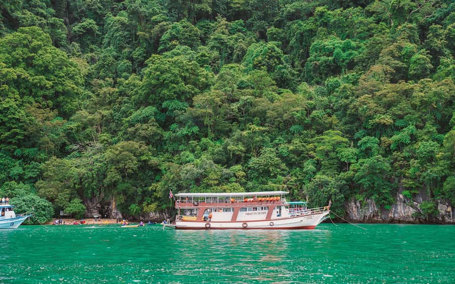 Phuket: Sunset Dinner in Phang Nga Bay by Big Boat - From Phuket hotels to Ao Por Pier: how the day starts