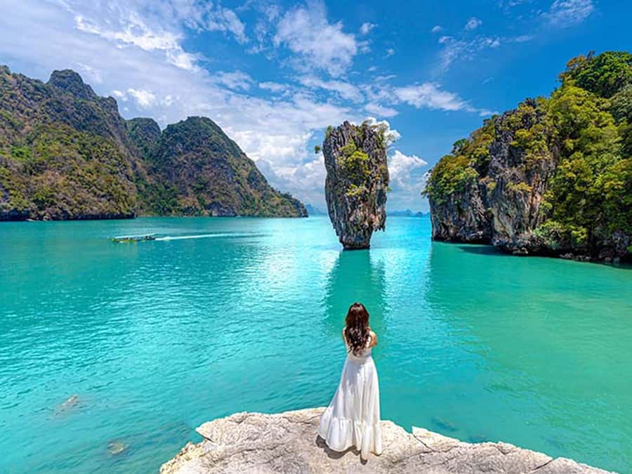 Phuket: Twilight Sunset Tour with Bioluminescent Plankton - First island exploration: cave passages and sheltered lagoons