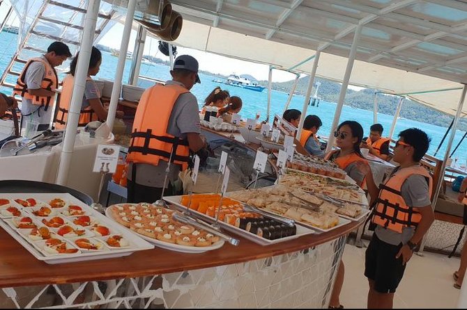 Phuket VIP Hype Luxury Boat Cruise with Party & DJ Vibes - Passing Promthep Cape at Sunset: The Party Rhythm Comes Home