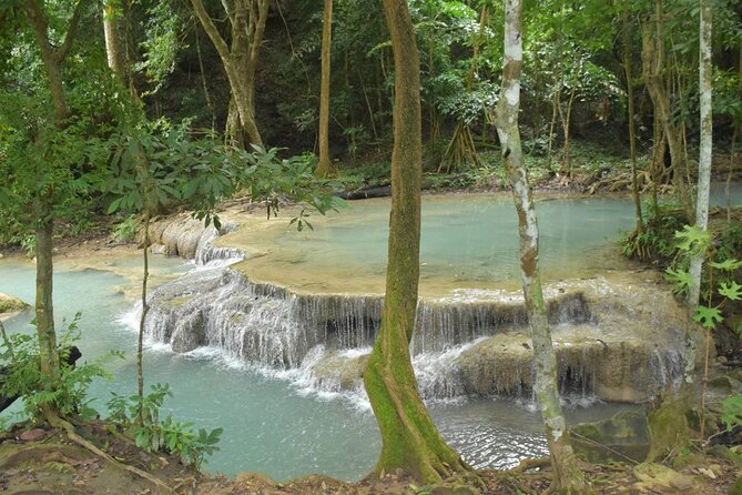 Private 2 Day Tour to Erawan Waterfall and Highlights of Kanchanaburi - Day 1: Mae Klong railway market and Damnoen Saduak