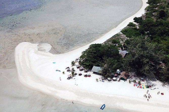 Private Full-Day Red Dragon Yacht for Snorkeling Koh Tan & Visit Pink Dolphin - Ko Mat Sum and pig island: fun on land, plus a nature-control reality check