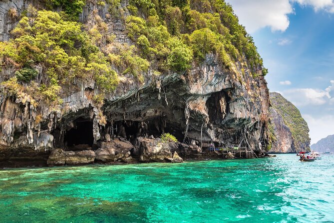 Private Phi Phi and Khai Islands Snorkeling Tour by Speedboat - Maya Bay: iconic views, shared water reality