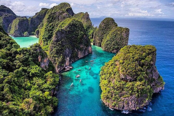 Private Phi Phi and Khai Islands Snorkeling Tour by Speedboat - Pileh Bay: the lagoon stop where snorkeling and paddle time make sense