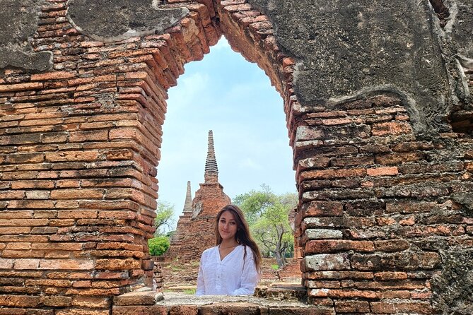 Private Tour to Ayutthaya, World Heritage Site with Boat Tour - Wat Mahathat: Buddha Head in Bodhi Tree Roots
