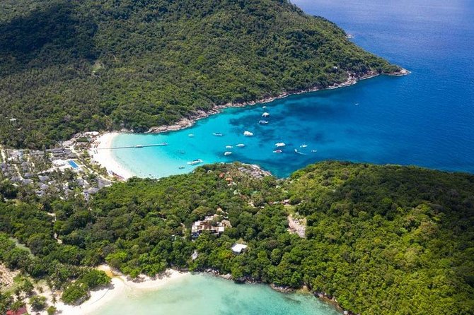 Racha and Coral Island One Day Trip + Sunset by Luxury Catamaran From Phuket - Stop One at Ko He (Coral Island): Beach time with optional sea activities