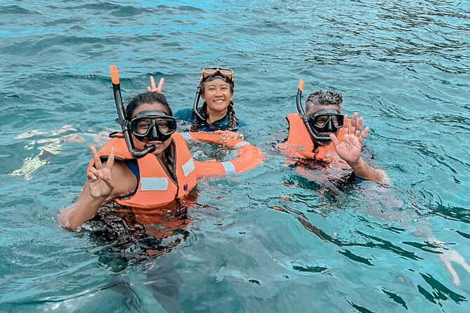 Raya Island / Mai Ton Island Private Boat Tour - Koh Rang Yai: the quieter beach stop with fruit, drinks, and sunset time