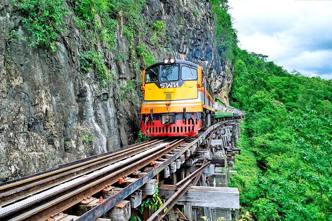 River Kwai Day Tour from Bangkok – History, Scenery & Culture - Kanchanaburi War Cemetery: Where the Tone Turns Serious