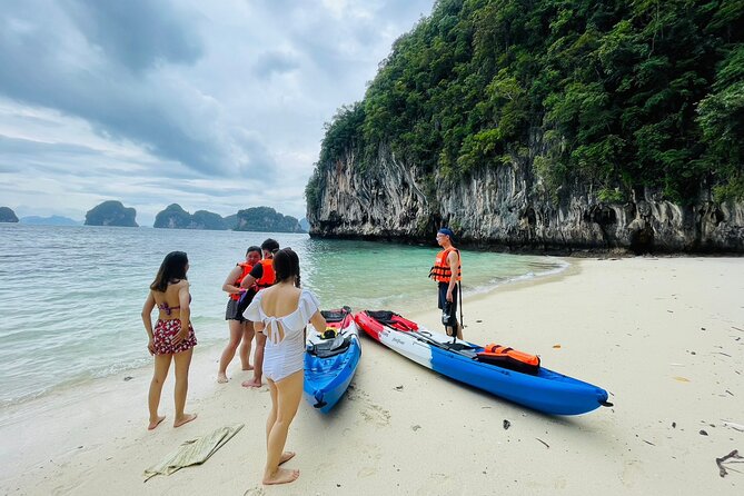 Snorkeling and Kayaking Tour at Hong Islands From Krabi - Stop 1: Daeng Island snorkeling—small fish colors, coral detail, and easy-water conditions