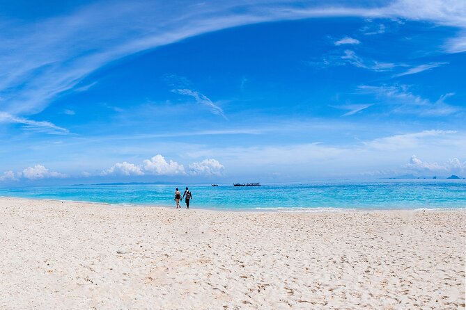 Snorkeling Phi Phi Islands Tour From Phi Phi by Speedboat - Ko Yung, Nui Beach, and Viking Cave: Coves, Cliffs, and Calm Water Moments