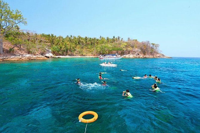 Snorkeling Tour to Coral & Maiton & Racha Island from Phuket - Maiton Private Island: the short snorkel stop and dolphin odds
